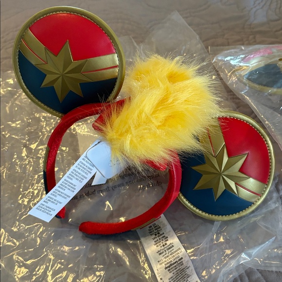 Set of 2 Disney Parks Captain Marvel Mohawk Ear Headbands retails for 29.99 each - Picture 2 of 8